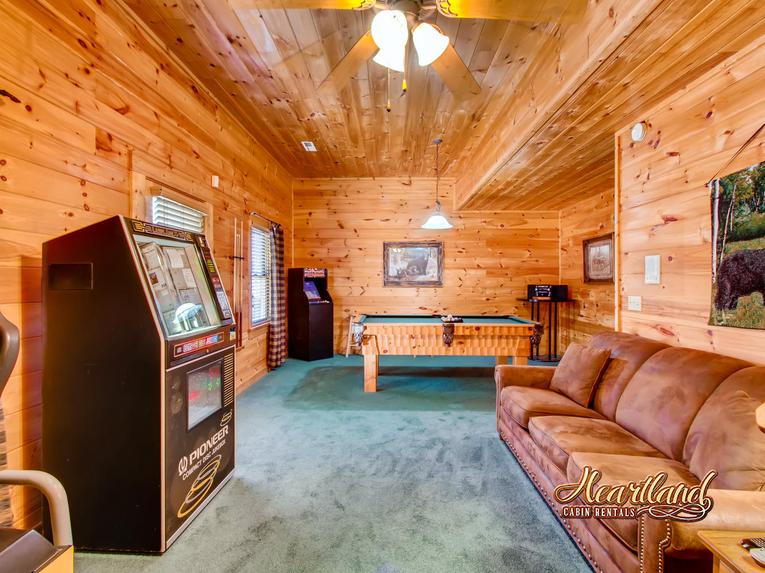 Game Room is located with a Jukebox, Video Games, Pool Table, Cable TV and a Queen sleeper sofa